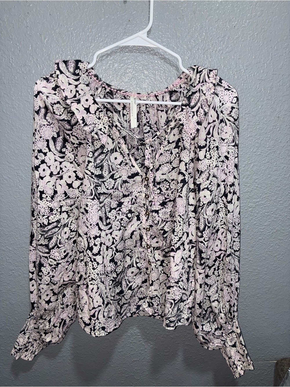 Anthropologie button-up peasant blouse featuring a black white floral print